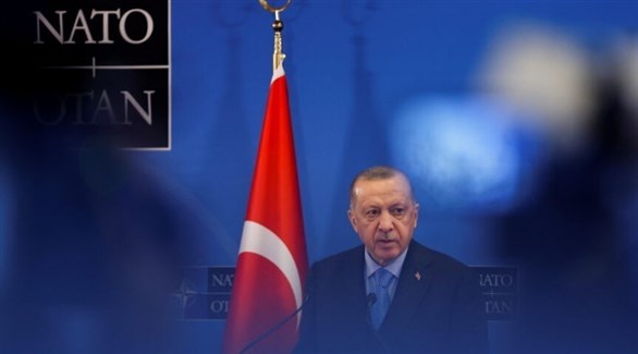أردوغان متحدثاً من داخل مقر حلف الأطلسي في بروسكل (أرشيف / رويترز)