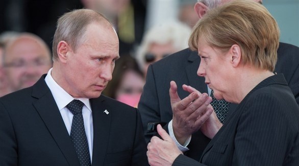 المستشارة الألمانية السابقة أنجيلا ميركل والرئيس الروسي فلاديمير بوتين (أرشيف)
