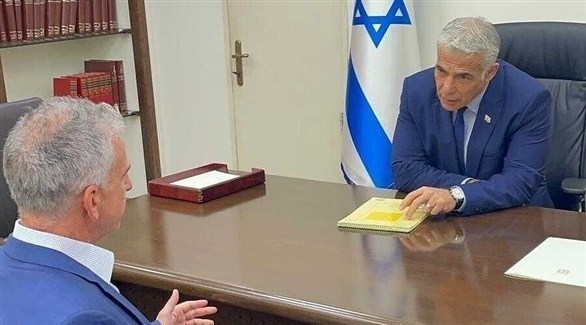 رئيس الوزراء الإسرائيلي يائير لابيد ورئيس الموساد ديدي برنياع (أرشيف)