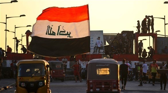 متظاهرون في ساحة التحرير وسط بغداد (تويتر)