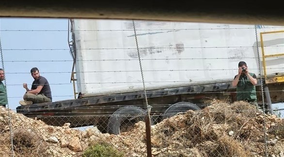 عناصر من حزب الله على الحدود بين إسرائيل ولبنان (موقع واللا)