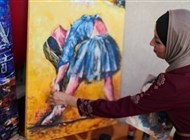 فلسطينية تترجم معاناة المرأة في غزة بلوحات مستوحاة من الباليه