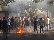 مقتل 200 محتج إيراني ورئيسي يشيد "بالحريات"