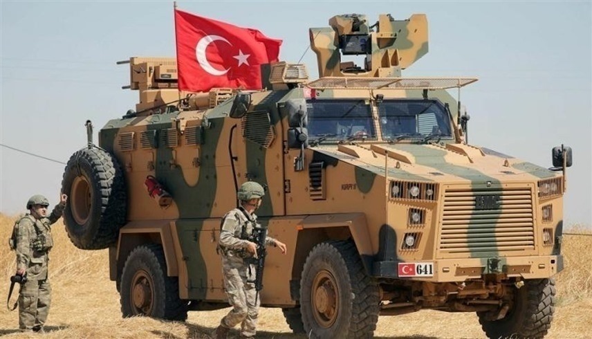 آلية عسكرية وجنود من الجيش التركي في سوريا (أرشيف)