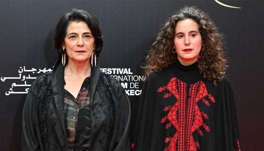 المخرجة هيام عباس والممثلة لينا سويلم خلال مهرجان مراكش (أ ف ب)