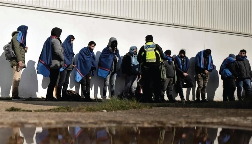 مهاجرون غير شرعيين في بريطانيا يستعدون لترحيلهم إلى رواندا (أرشيف)