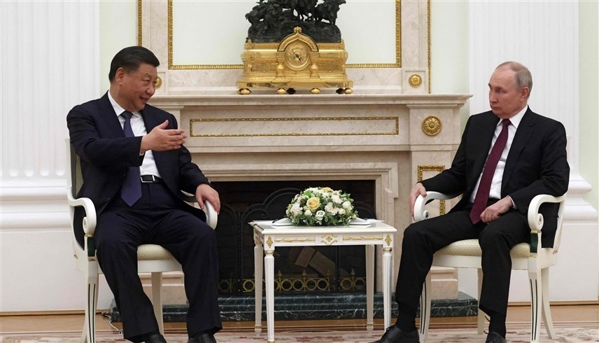 الرئيسان الروسي بوتين ونظيره الصيني شي جينبينغ (أ ف ب)