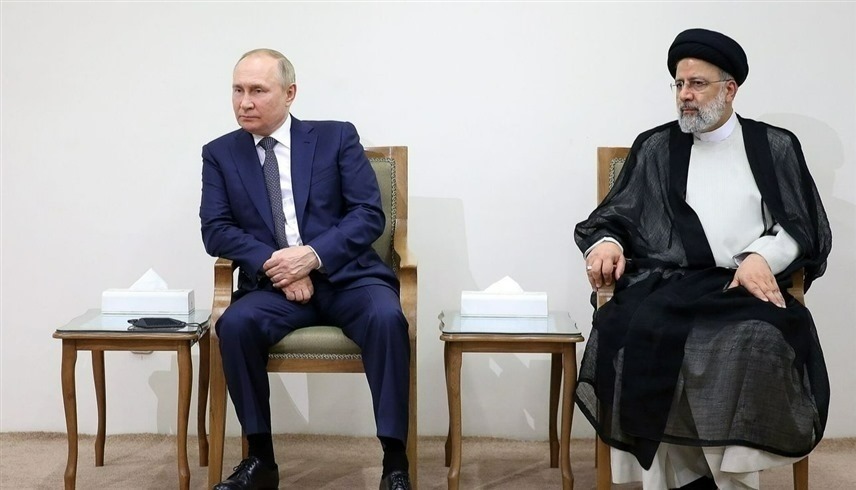 الرئيسان الروسي فلاديمير بوتين والإيراني ابراهيم رئيسي.