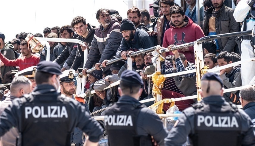 مجموعة من المهاجرين إلى إيطاليا (أرشيف)