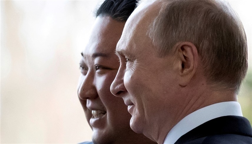 الرئيسان الروسي فلاديمير بوتين والكوري الشمالي كيم كيم جونغ أون (رويترز)