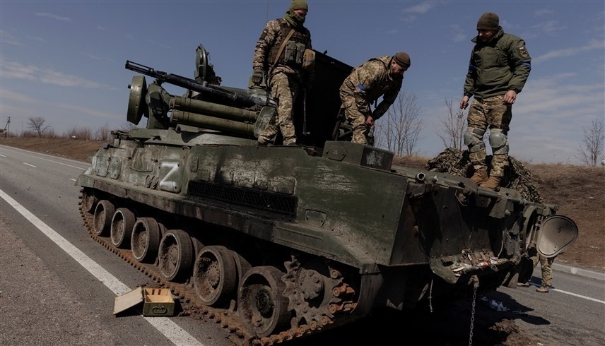 مجموعة من القوات الروسية في دونباس (رويترز)