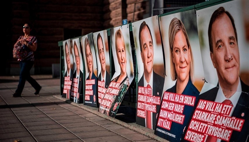 لافتات دعائية للمرشحين في الانتخابات الفنلندية (رويترز)