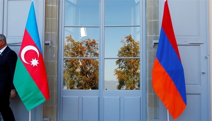 علما أرمينيا وأذربيجان خلال محادثات سابقة (رويترز)