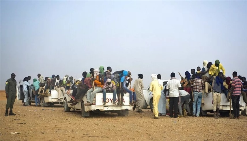 مهاجرون من النيجر  قرب ليبيا (أ ف ب)