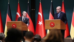 شولتس يدعو أردوغان إلى برلين